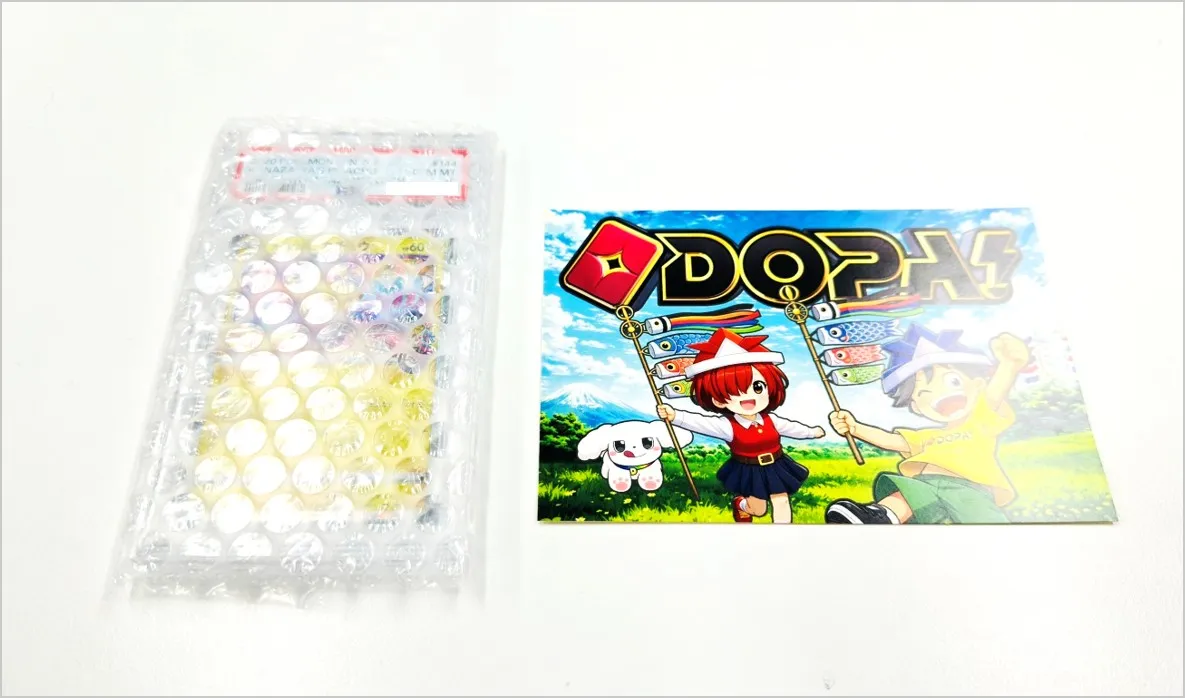 DOPA 届いたカードとDOPAオリパのチラシ